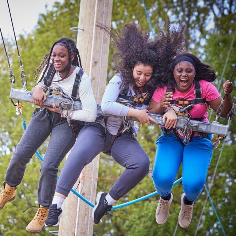 Students on high-swing