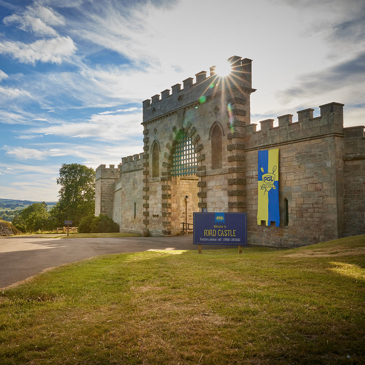 Exterior shot showing the stone bricks and PGL flags at the entrance of Ford Castle