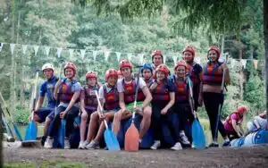 Students rafting on a PGL residential school trip.