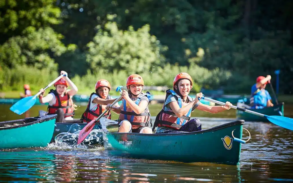 Pupils kayaking on a primary school residential trip.