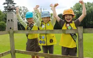 Three brownies wearing helmets
