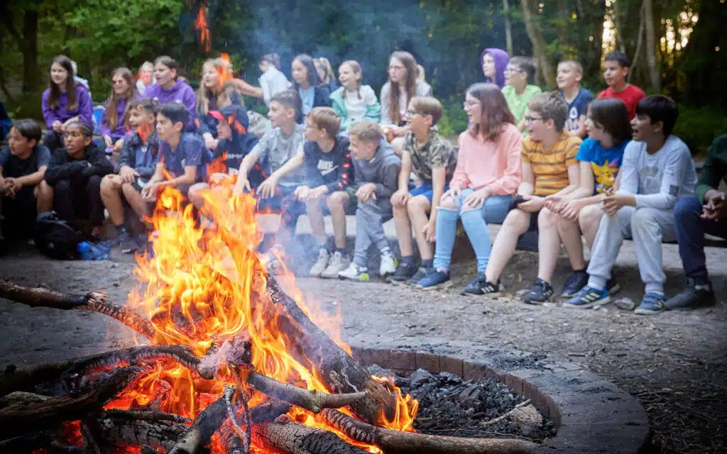 Group gathered around a campfire