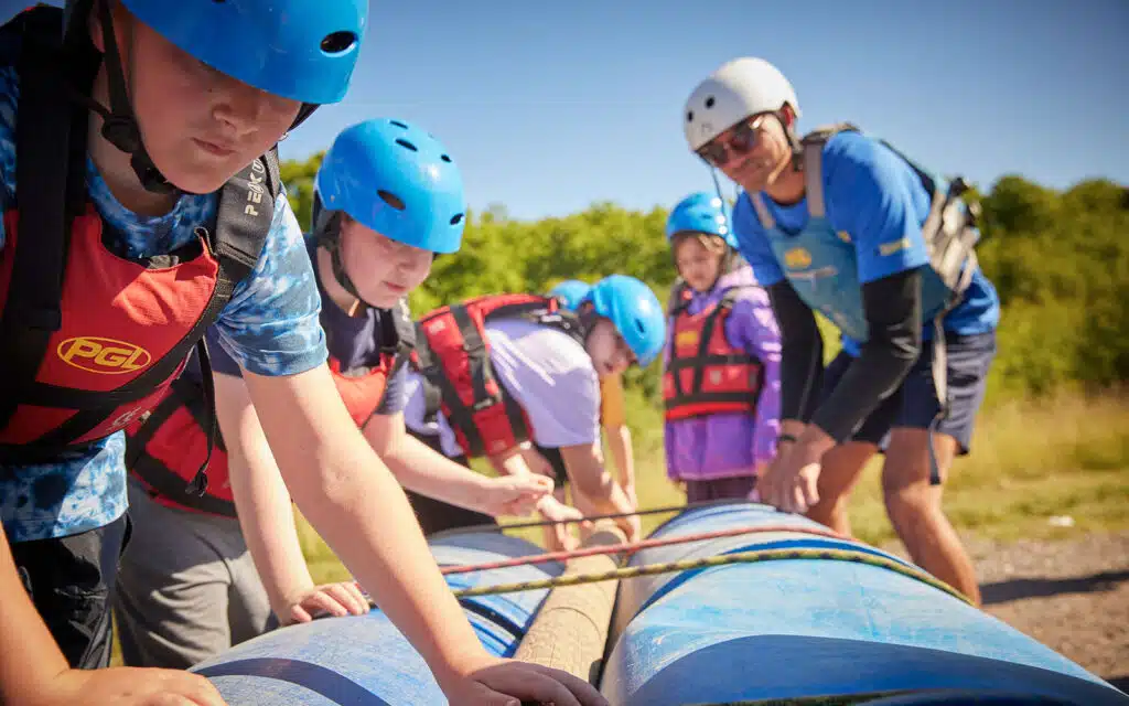 Pupils building a raft