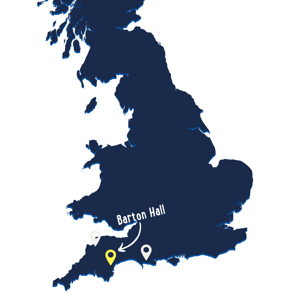 A map of England highlighting Barton Hall with a yellow marker and an arrow pointing to its location in the southwestern part of the country.