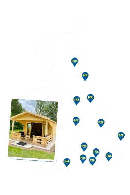 Map of the UK with PGL locations marked by pins and inset image of a wooden cabin with an open door and seating area.
