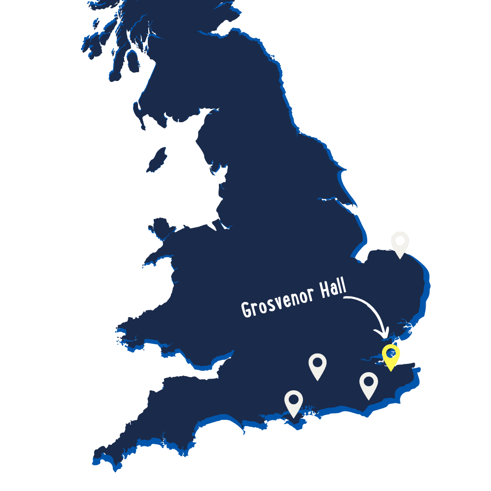 Map of southern England highlighting the location of Grosvenor Hall with a yellow marker and arrow; additional white location markers are also shown.
