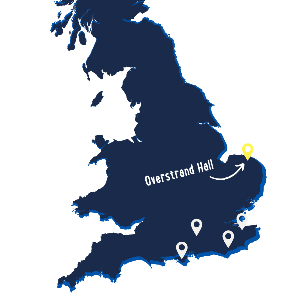 A map of southern England with pins marking five locations; "Overstrand Hall" is highlighted with a yellow pin and label in East Anglia.