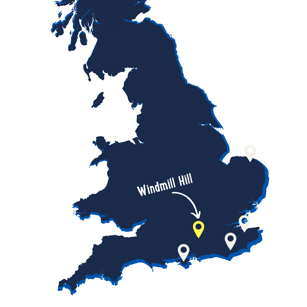 Map of southern England showing the location of Windmill Hill marked with a yellow pin and three other locations marked with white pins.
